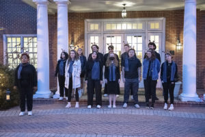 UMW Symfonics sang carols in the Jepson Alumni Executive Center courtyard as guests arrived. Photo by Tom Rothenberg.