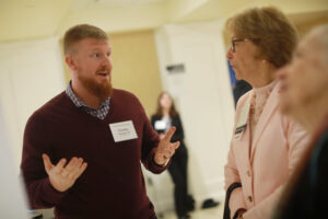 Timothy Philbeck '23 chats with Patti Boise Kemp '69 at the 2023 Donor Appreciation Luncheon and Student Showcase. Photo by Karen Pearlman. 
