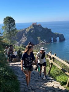 UMW students Jessica Oberlies (left) and Jazmine Montecino return from a hike to San Juan de Gaztelugatxe last summer during a 'UMW in Spain' study abroad trip. The experience is one of Mary Washington's three longest-running faculty-led study abroad programs offered through the Center for International Education. #MaryWashDay #TogetherUMW