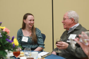 Ed Morawetz Jr. chats with Noel Shenk '24, the recipient of the Christopher Edward Morawetz Scholarship, during the Donor Appreciation Luncheon. Photo by Karen Pearlman Photography.