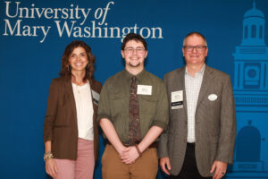 Deborah and James Llewellyn '83 with the Llewellyn Scholarship in Psychology recipient, sophomore Robert Oehler. Photo by Karen Pearlman Photography.