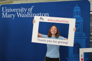UMW students took pictures in the Cedric Rucker University Center to express their gratitude toward the 2,224 donors who gave on the sixth annual Mary Wash Giving Day.