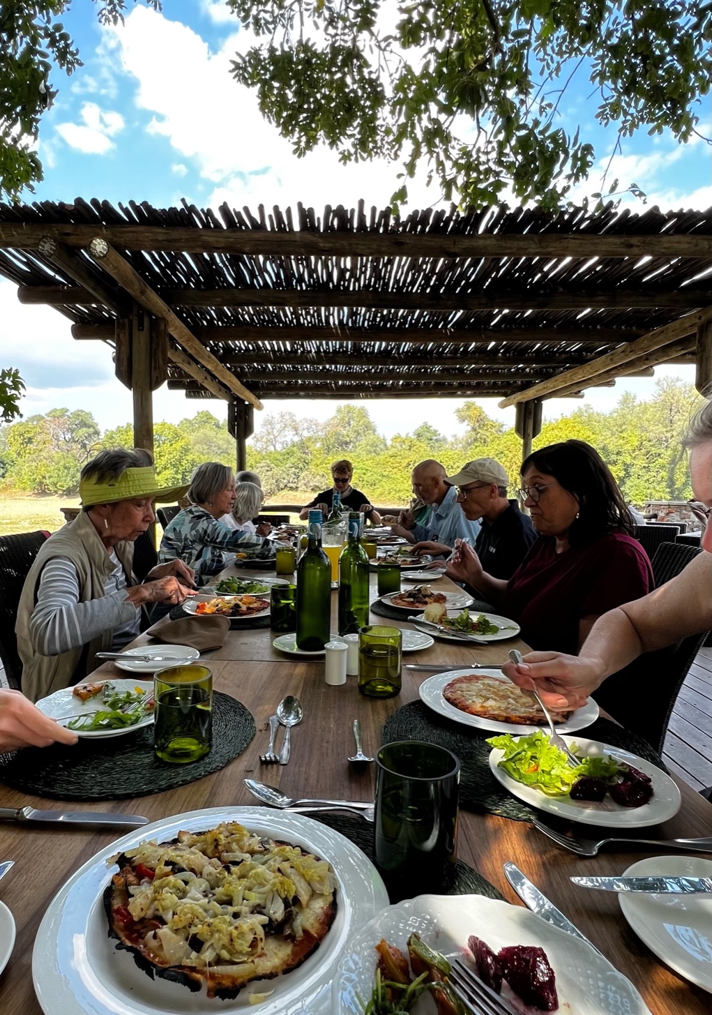 Sally, Dr. Dolby, and other Mary Washington alumni dine al fresco in Africa on the UMW Alumni on the Road trip. Photo courtesy of Sally Brannan Hurt.