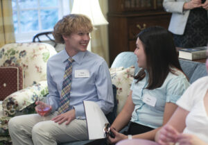 First-year students Adam McAninley ’27 and Marina Klein '27 talk in the Kalnen Inn living room. Photo by Karen Pearlman Photography.