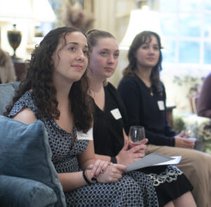 From left: Hannah Stottlemyer '24, Abby Tank '24, and Adelaide Gill ’25 listen to remarks at the Washington and Alvey Scholar reception. Photo by Karen Pearlman Photography.