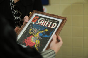 One of Duke Stableford's embroidered creations inspired by Stan Lee's comic book covers. Stableford, a 1981 alum who passed away in January, created 30 needlepoints of Marvel Comics covers that will be on display in George Washington Hall before the Great Lives lecture on Stan Lee on Thursday. Photo by Karen Pearlman.
