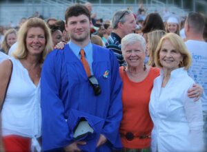 From left to right: Judy's daughter, Ella, and her grandson, Mitchell, with Judy and Lynne at Mitchell's high school graduation. Photo courtesy of Judy Gourley Kamishlian '59. 