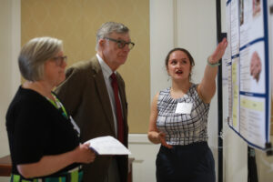 Sofia shares her research into the psychology behind Mozart, Beethoven, and other great composers with Bill Williams and Pat Poole at the 2024 Donor Appreciation Luncheon and Student Showcase. Photo by Karen Pearlman.