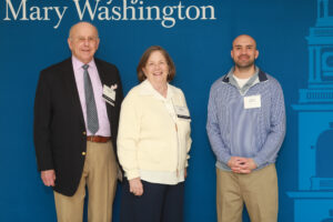 Senior Jarad Ponce, recipient of the Carrie S. and Arthur L. Galloway Scholarship, among others, poses for a picture with George K. and Sallie Galloway Gill ’65, who named their scholarship in memory of Sally's parents. Photo by Karen Pearlman.