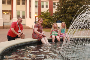 Alumni and their families can enjoy student-led campus tours or explore favorite spots, like the fountain on Palmieri Plaza, on their own. Photo by Karen Pearlman.