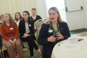 Student Alumni Ambassador Corbin Poyer '24, who is the student representative to the Alumni Board, poses a question to one of the presenters. Photo by Karen Pearlman.