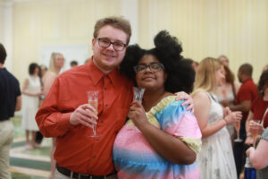 Sebastian Melin and Kapri Robinson celebrate their graduation and look forward to the future. Photo by Karen Pearlman.