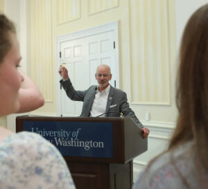 President Paino raises his glass to toast the 2024 graduates. Referencing the University's emphasis on experiential learning, he said that coming to UMW in the midst of a pandemic made the Class of 2024 among the "best prepared graduates in the history of Mary Washington." Photo by Karen Pearlman.