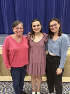 Madeline (center) with her mother, Amy Acker '94, and sister Meredith after the Performing Arts Company's big show this spring. The twins were diagnosed with hearing loss in the first grade, which inspired Madeline's decision to study genetics at Mary Washington. Photo courtesy of Madeline Brunt.