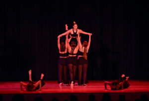 Madeline is lifted by her fellow Performing Arts Company dancers in 'Heaven is Here,' a piece choreographed by Gabby Lyon '25, in fall 2023. Photo by Chenin Gruber.