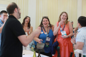 Class of 2014 graduates, including Danielle DeSimone (right) and Shelby Orlando (center), enjoy the Virginia wine, beer, and cider tasting at the Jepson Alumni Executive Center on Saturday. Photo by Karen Pearlman.