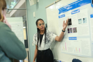 Max W. De La Cruz Morrobel presents her findings on the expression of plasmodesmal regulatory genes in response to brassinosteroids. Photo by Karen Pearlman.