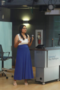 Loren Delgadillo Llano presents her research on how starving triple negative breast cancer cells can slow proliferation. Photo by Karen Pearlman.