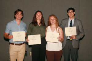 At UMW's 25th annual Summer Science Institute, several students earned awards from the John C. and Jerri Barden Perkins '61 College of Arts and Sciences Student Research Endowment, which will provide funding for them to continue their research during the academic year. From left: Boone Fleenor '26, Morgan Hicok '25, Kate Green '25, and Joseph Gasink '26. Photo by Karen Pearlman.