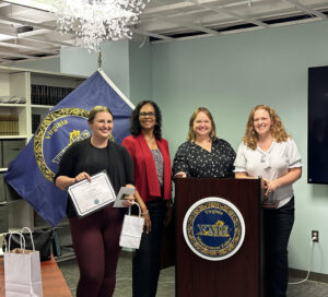 Kristen (left) was required to take a Virginia Tech graduate course, 'Public and Nonprofit Financial Management,' in order to complete the VMF program. From left: Kristen, Sheryl Bailey (the course's instructor), Cecily Rodriguez (VT/VMF staff), and Anne Walters (VT/VMF staff). Photo courtesy of Kristen Ramey.