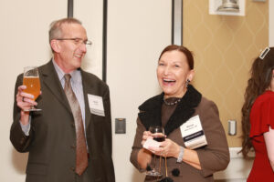 Renee Allen Kuntz '85 and husband Scott enjoy the evening's festivities. Renee recently made a pledge that pushed the Beyond the Classroom Endowment, which funds study abroad and other high-impact learning opportunities for students, past the $1 million mark in gifts and pledges. Photo by Karen Pearlman.