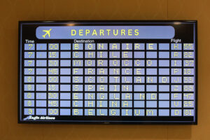 Keeping with the international education theme, 'Eagle Airlines' screens outside Chandler Ballroom announced flight arrival and departure times. Photo by Karen Pearlman.