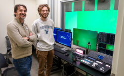 Digital Knowledge Center Director Cartland Berge (left) and UMW senior Steve McClanahan pose for a picture in the Charnoff Production Studio, along with the upgraded technology that was funded by a Fund for Mary Washington Impact Grant. Photo by Sam Cahill.