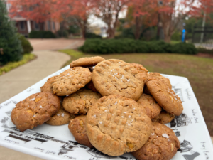 College Crunch Cookies in front of the Jepson Alumni Executive Center.