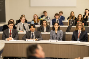 High schoolers in the We the People competition engage in simulated congressional hearings in which they are asked complex questions about political science, law, and philosophy by a panel of judges. Photo courtesy of Sam Ulmschneider.