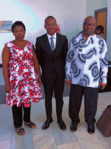 Aloysious poses for a photo with his parents at the airport before coming to the United States to attend Mary Washington. Photo courtesy of Aloysious Kabonge.