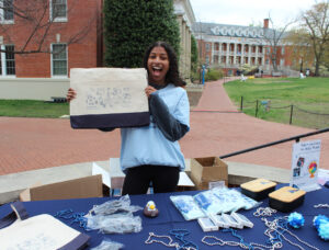 At the Mary Wash Day headquarters, students had the opportunity to play games and win prizes, such as an illustrated Mary Wash tote bag, UMW bento boxes, and socks decorated with iconic Mary Washington-themed images of the Bell Tower and Adirondack chairs.