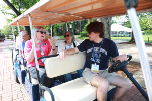 Recent grad Shadwick Yoder '25 gave golf-cart tours of campus throughout Reunion Weekend. Photo by Karen Pearlman.