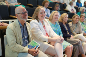 From left: President Troy Paino, Vice President for Advancement and Alumni Engagement and UMW Foundation Executive Director Katie Turcotte, JB Blair '82, and her family and friends listen to the remarks by Rob-Eastman-Mullins '00. Photo by Karen Pearlman.
