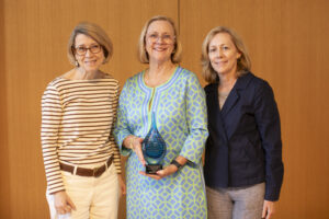 JB Blair '82 (center), recipient of the Frances Liebenow Armstrong '36 Service Award, poses for a photo with Barbara Dixon '82 (left) and her sister, Courtney Blair (right). Photo by Karen Pearlman.
