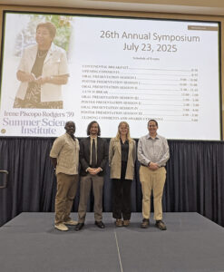 Eric Torres '26 (center left) and Lily Gruss '27 (center right) pose with their faculty mentors, Professor of Geology and Environmental Science Ben Odhiambo Kisila (left) and Professor of Chemistry Davis Oldham (right). Torres and Gruss placed first and second in the oral presentation category at the Irene Piscopo Rodgers '59 Summer Science Institute symposium, which earned them funding through the John C. and Jerri Barden Perkins '61 College of Arts and Sciences Student Research Endowment. Photo courtesy of Betsy Lewis/College of Arts and Sciences.