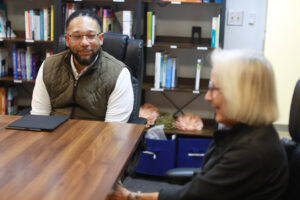Dr. Sims listens to Betty Talley, who shared that there were limited-to-no resources for mental health when she was a student at Mary Washington in the late 1960s. Photo by K Pearlman Photography.