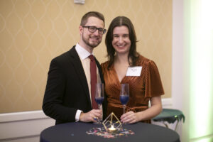A 2011 graduate, Matthew Baker, and his guest, Brooke Kelly.