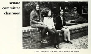 1971 Yearbook photo of three Mary Washington students sitting on a wall on Campus Walk. Caption reads: Senate Committee Chairmen. 