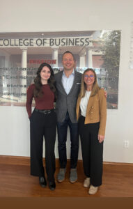 Three UMW alumni in the College of Business.