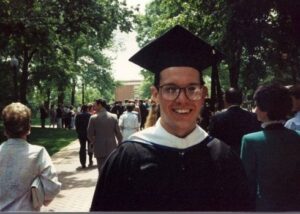 A photo of a student on Campus Walk during the 1989 Commencement at Mary Washington.