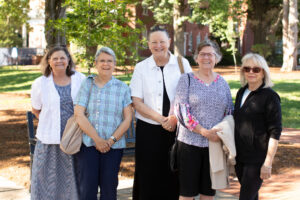 A group of 1976 alumnae on Campus Walk.