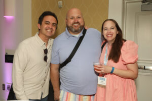 Three alumni at the all-class party.