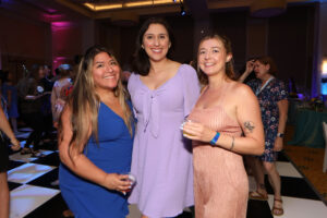 Three 2016 alumnae dressed up at the all-class party.