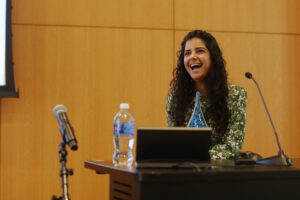 A 2012 alumna accepts a UMW alumni award in Seacobeck Hall's Weatherly Wing.